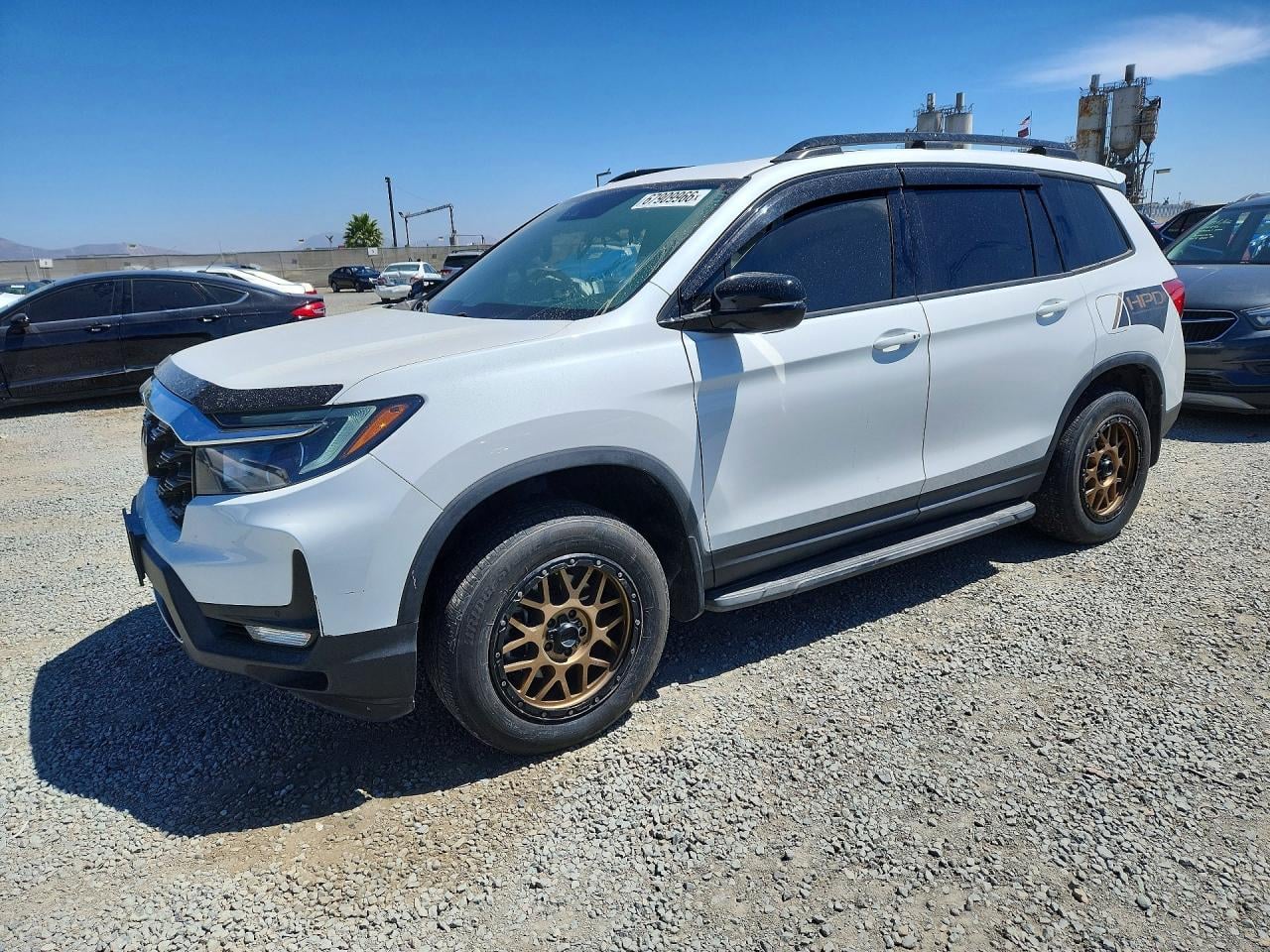 2023 HONDA PASSPORT ELITE | 5FNYF8H03PB005936 | UPCARS