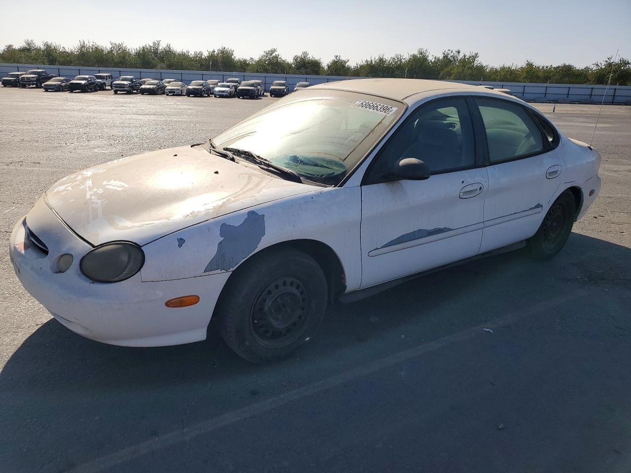 1999 FORD TAURUS LX | 1FAFP52U3XG253744 | UPCARS