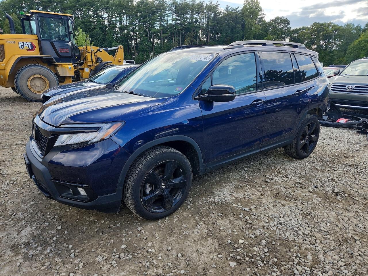 2021 HONDA PASSPORT ELITE | 5FNYF8H0XMB024091 | UPCARS