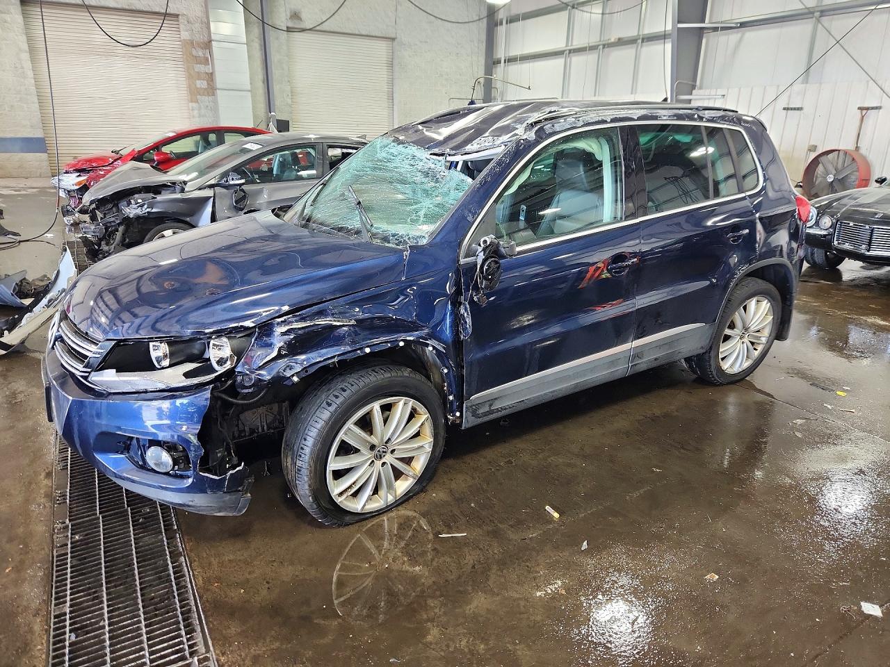 2014 VOLKSWAGEN TIGUAN S | WVGBV3AX3EW532866 | UPCARS