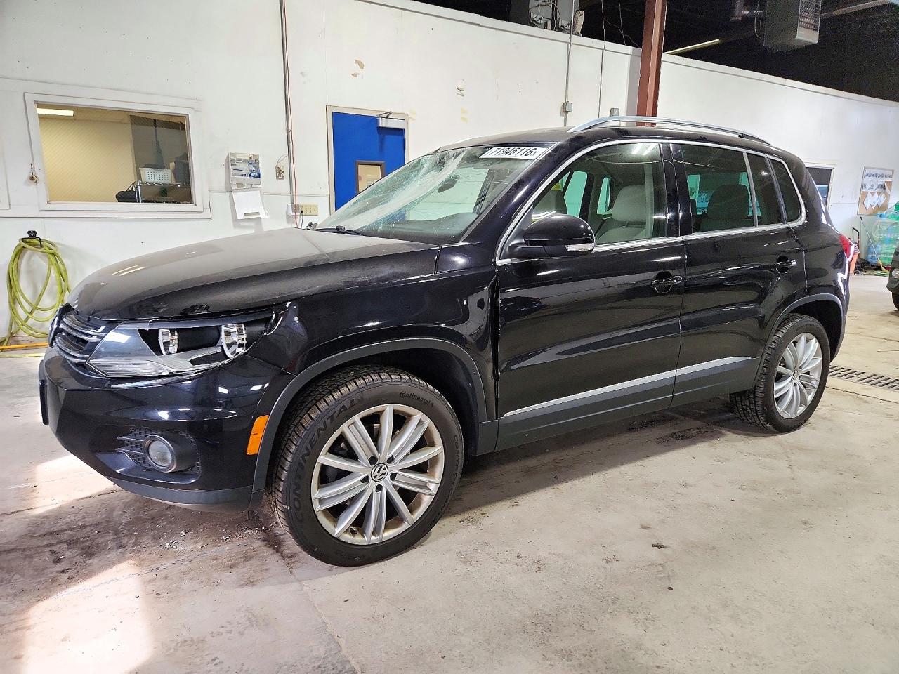 2014 VOLKSWAGEN TIGUAN S | WVGBV3AX0EW606566 | UPCARS