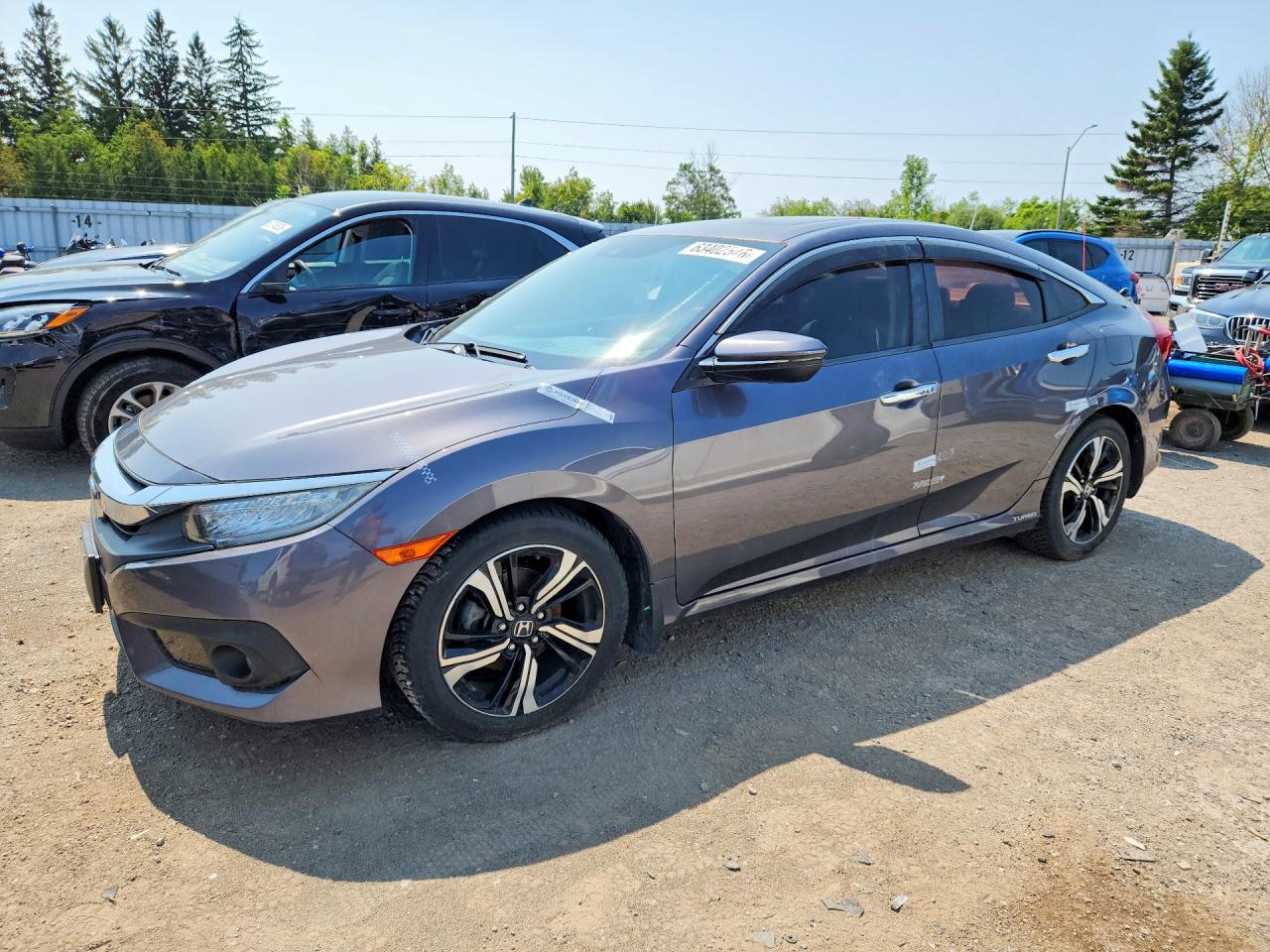 2017 HONDA CIVIC TOURING | 2HGFC1F95HH100570 | UPCARS
