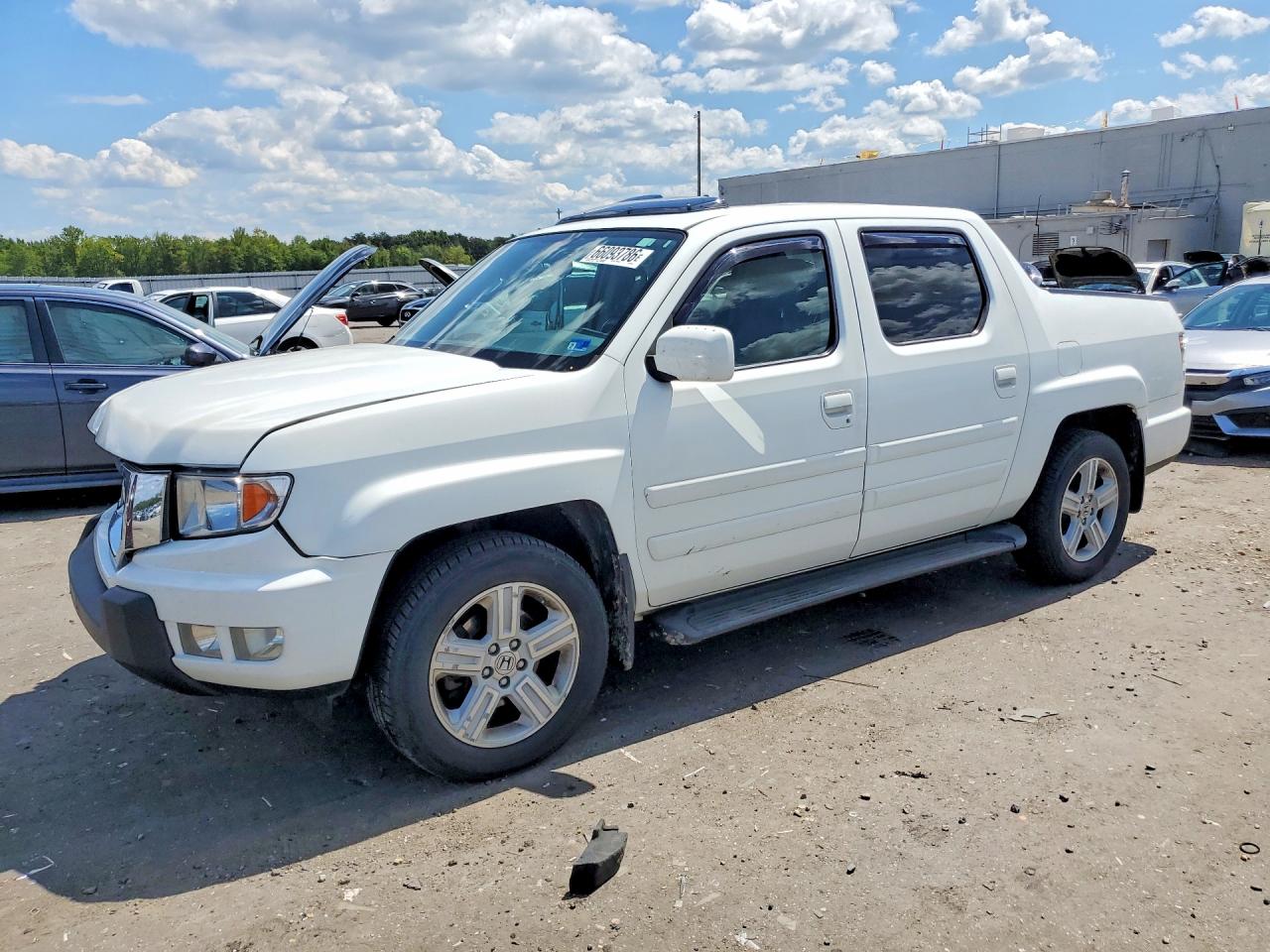 2014 HONDA RIDGELINE RTL | 5FPYK1F50EB004152 | UPCARS