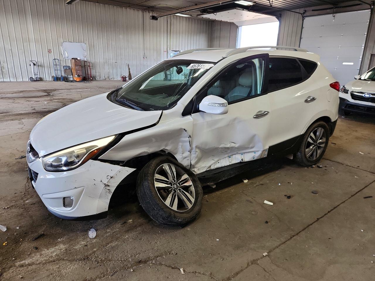 2014 HYUNDAI TUCSON LIMITED | KM8JU3AG3EU939225 | UPCARS