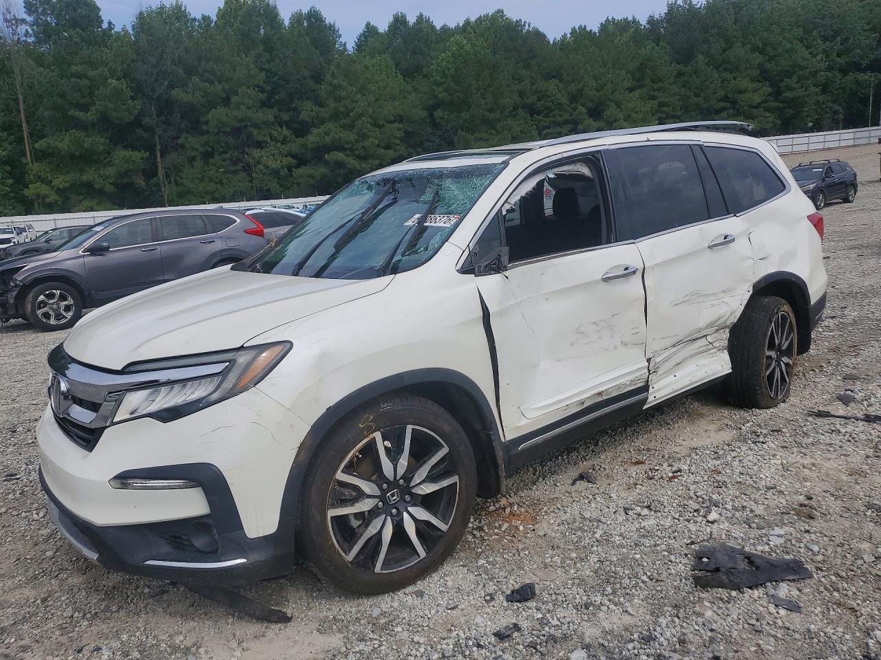 2019 HONDA PILO TOURING | 5FNYF5H99KB009429 | UPCARS