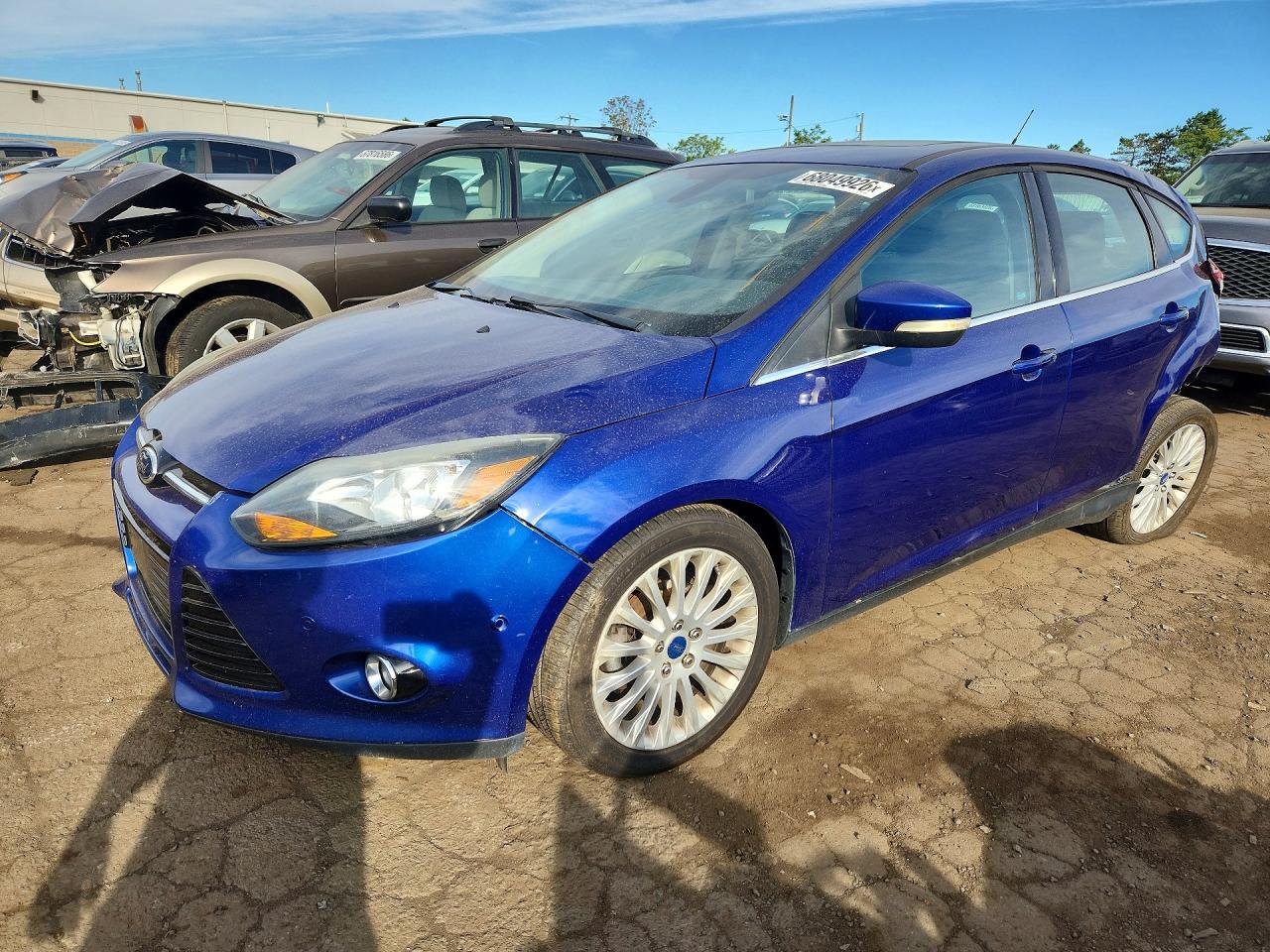 2012 FORD FOCUS TITANIUM | 1FAHP3N23CL390899 | UPCARS
