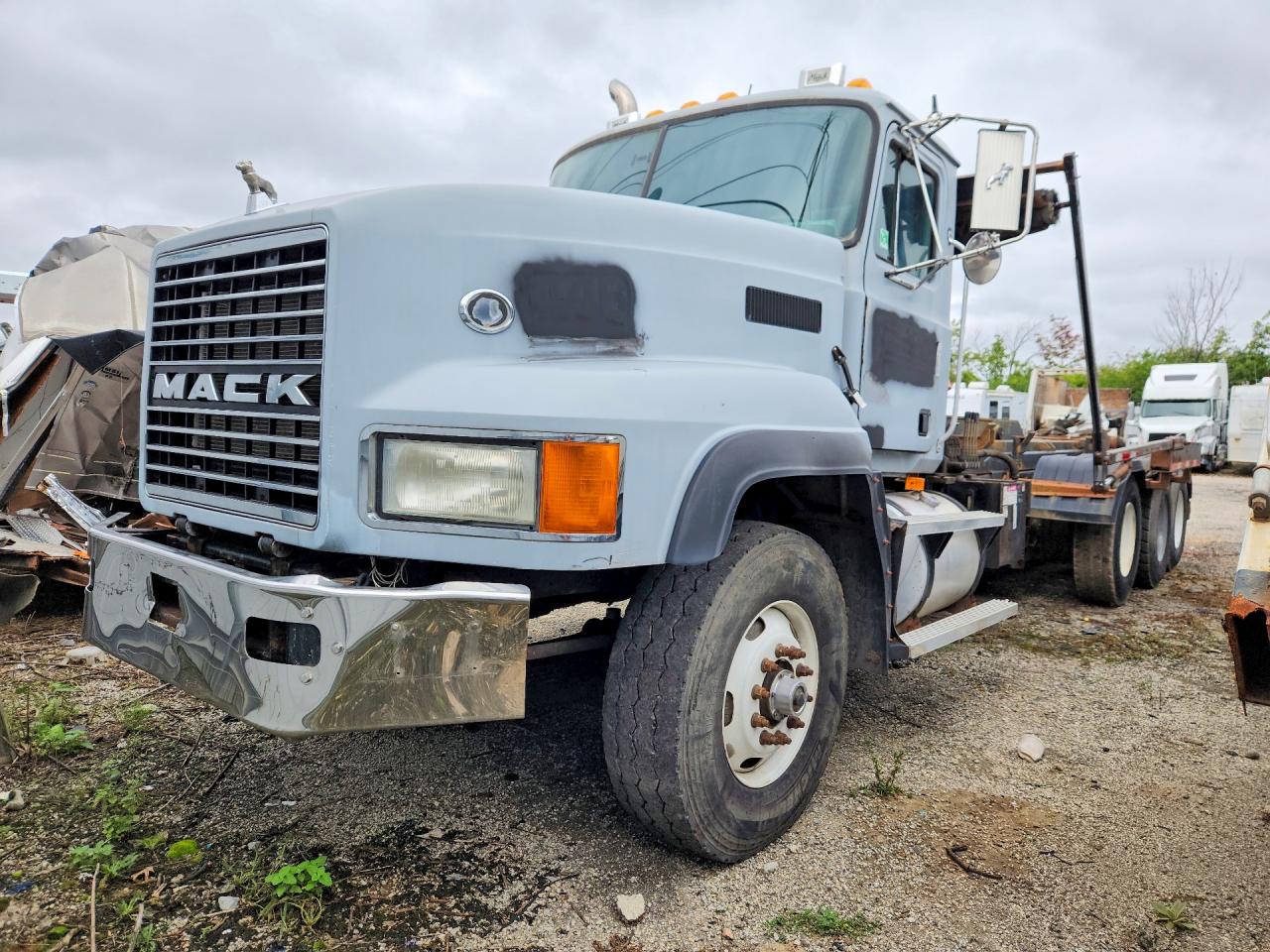 1999 MACK ALL OTHE ROLL-OFF CONTAINER TRUCK | 1M2AD09C8XW009117 | UPCARS
