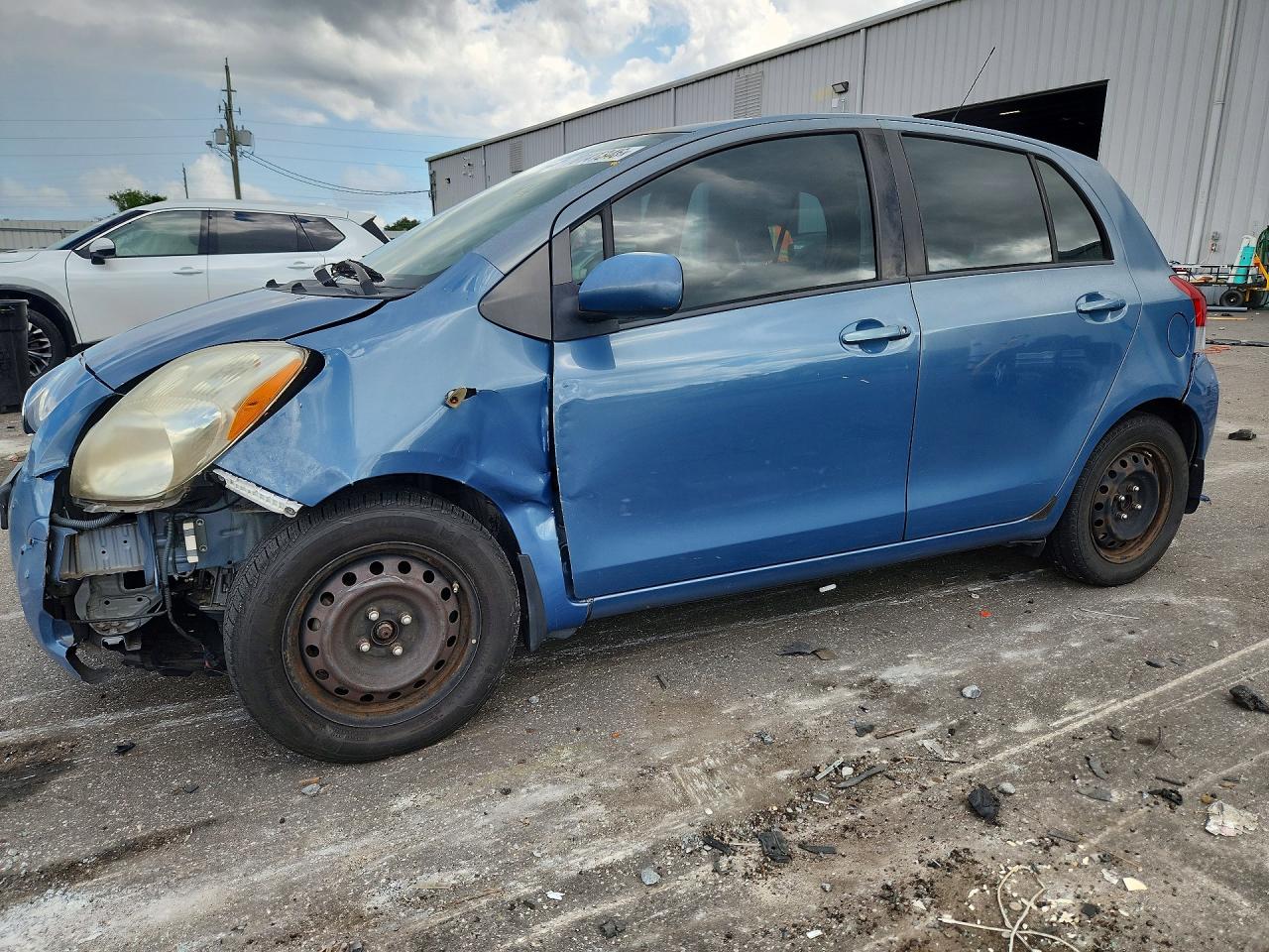 2009 TOYOTA YARIS BASE | JTDKT903195247235 | UPCARS