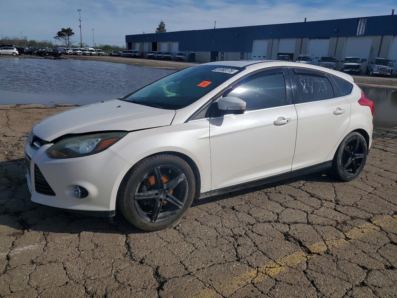 2012 FORD FOCUS TITANIUM | 1FAHP3N27CL428473 | UPCARS