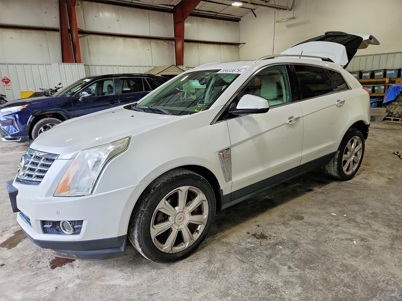 2015 CADILLAC SRX PREMIUM COLLECTION | 3GYFNGE34FS545704 | UPCARS