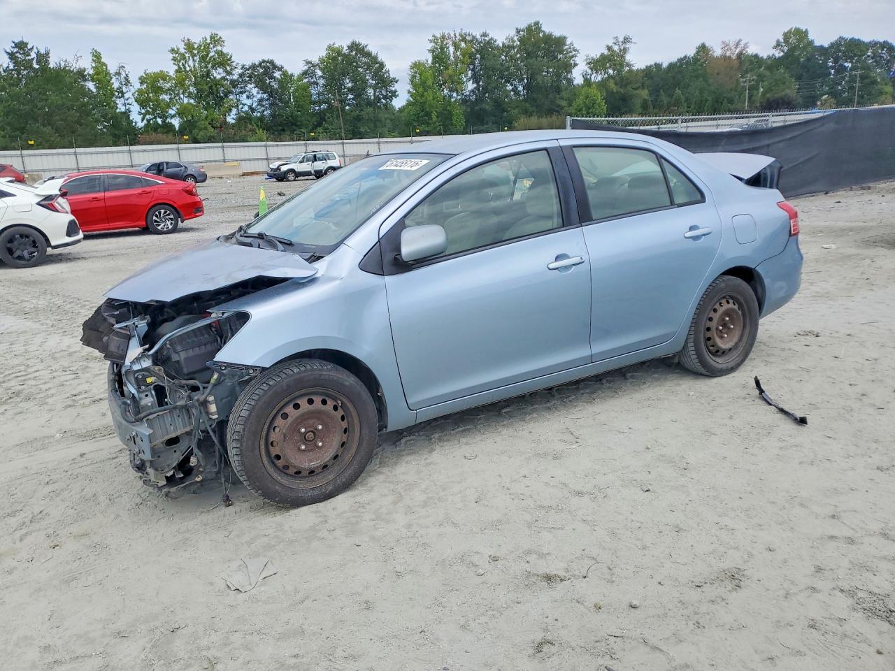 2009 TOYOTA YARIS BASE | JTDBT903291318076 | UPCARS
