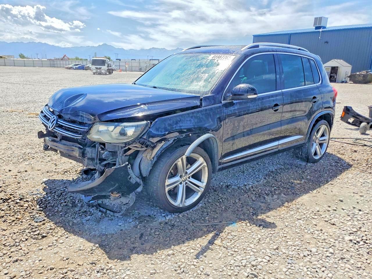 2014 VOLKSWAGEN TIGUAN S | WVGBV3AX2EW084670 | UPCARS