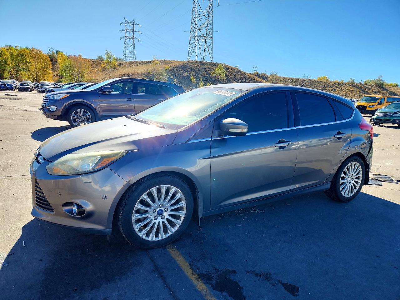 2012 FORD FOCUS TITANIUM | 1FAHP3N27CL314943 | UPCARS