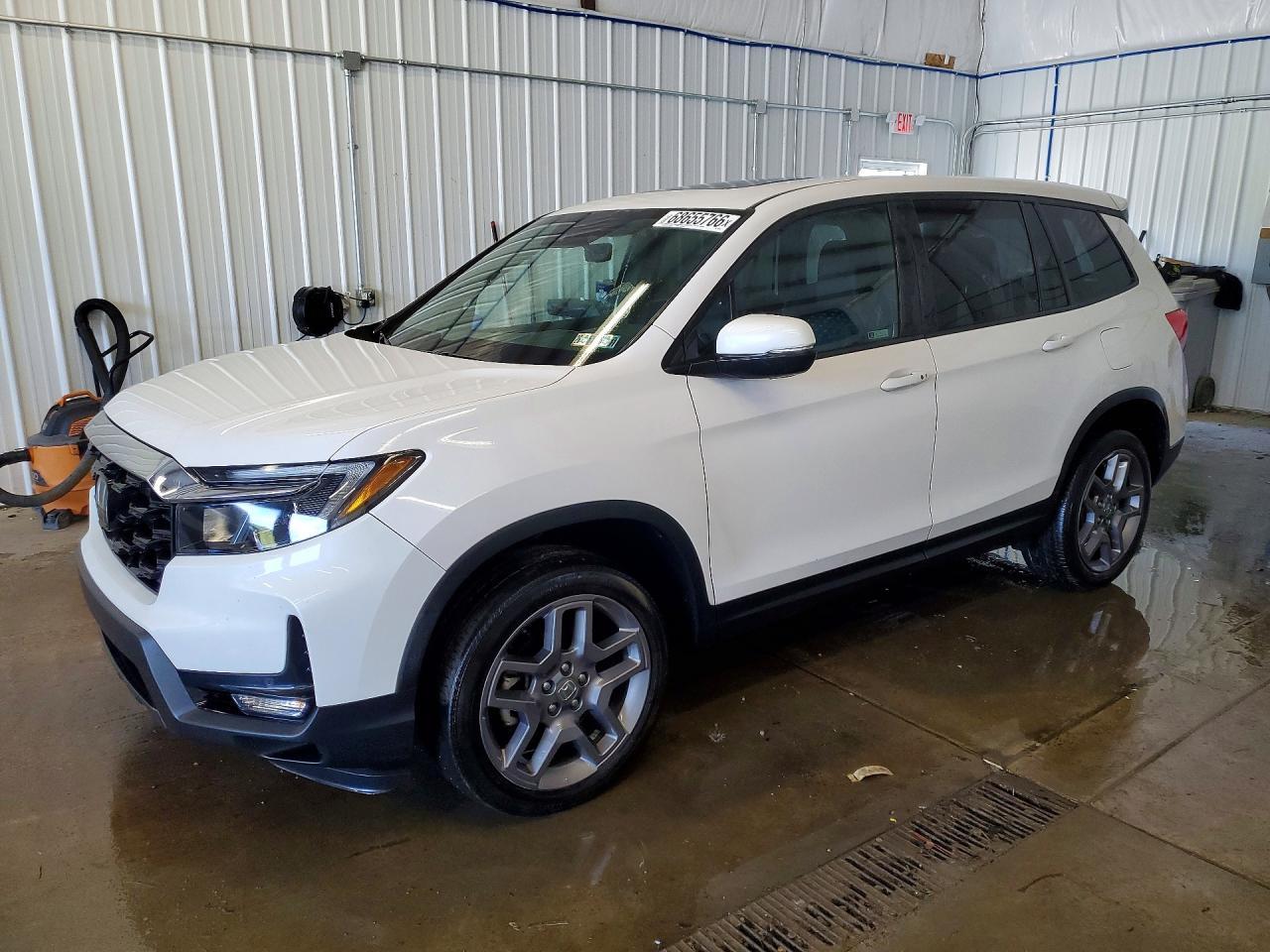 2023 HONDA PASSPORT EXL | 5FNYF8H59PB035499 | UPCARS