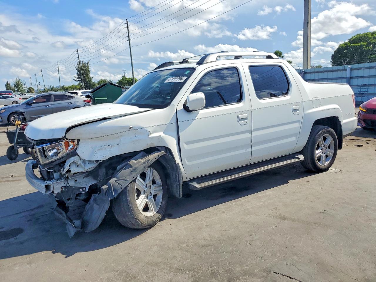 2014 HONDA RIDGELINE RTL | 5FPYK1F51EB001339 | UPCARS