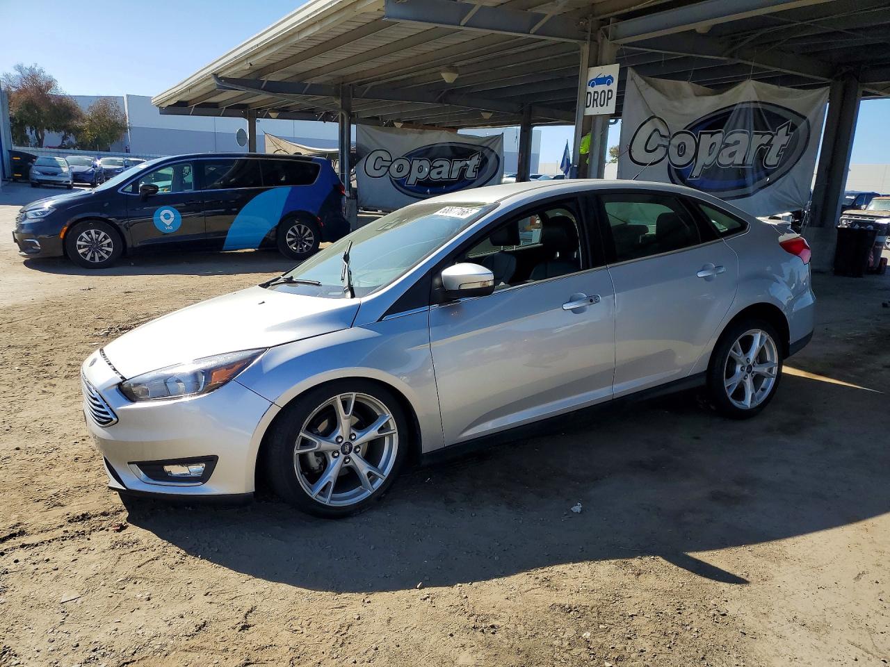2016 FORD FOCUS TITANIUM | 1FADP3J22GL203520 | UPCARS