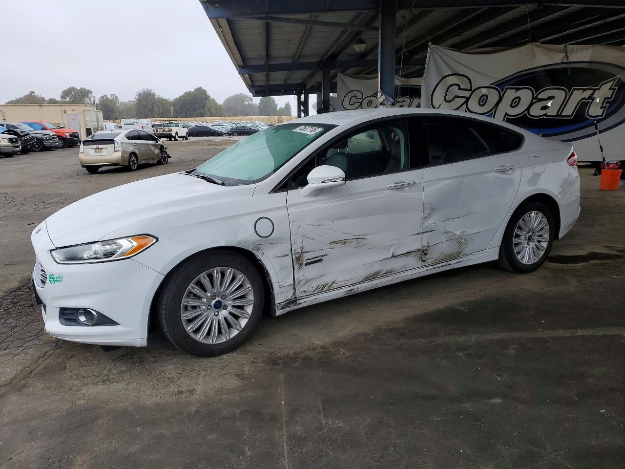 2015 FORD FUSION SE PHEV | 3FA6P0PUXFR147391 | UPCARS