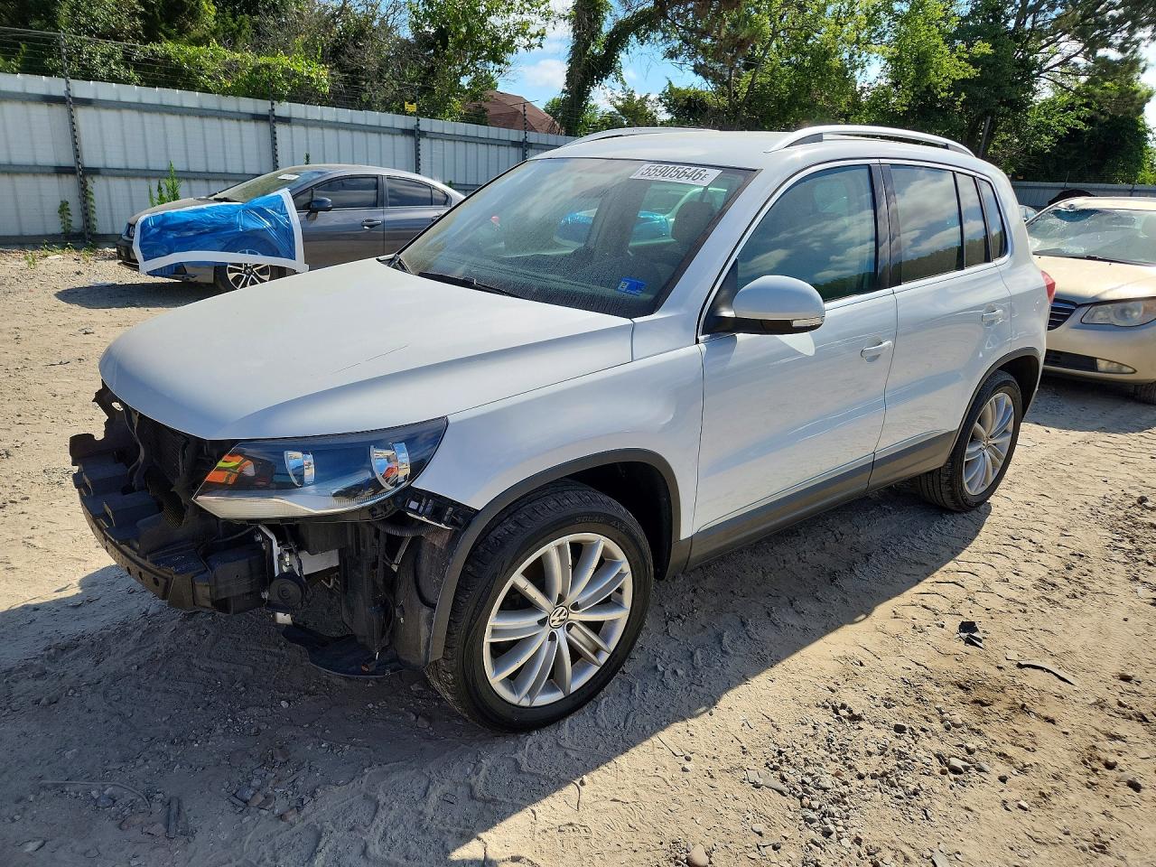 2014 VOLKSWAGEN TIGUAN S | WVGAV3AXXEW581526 | UPCARS