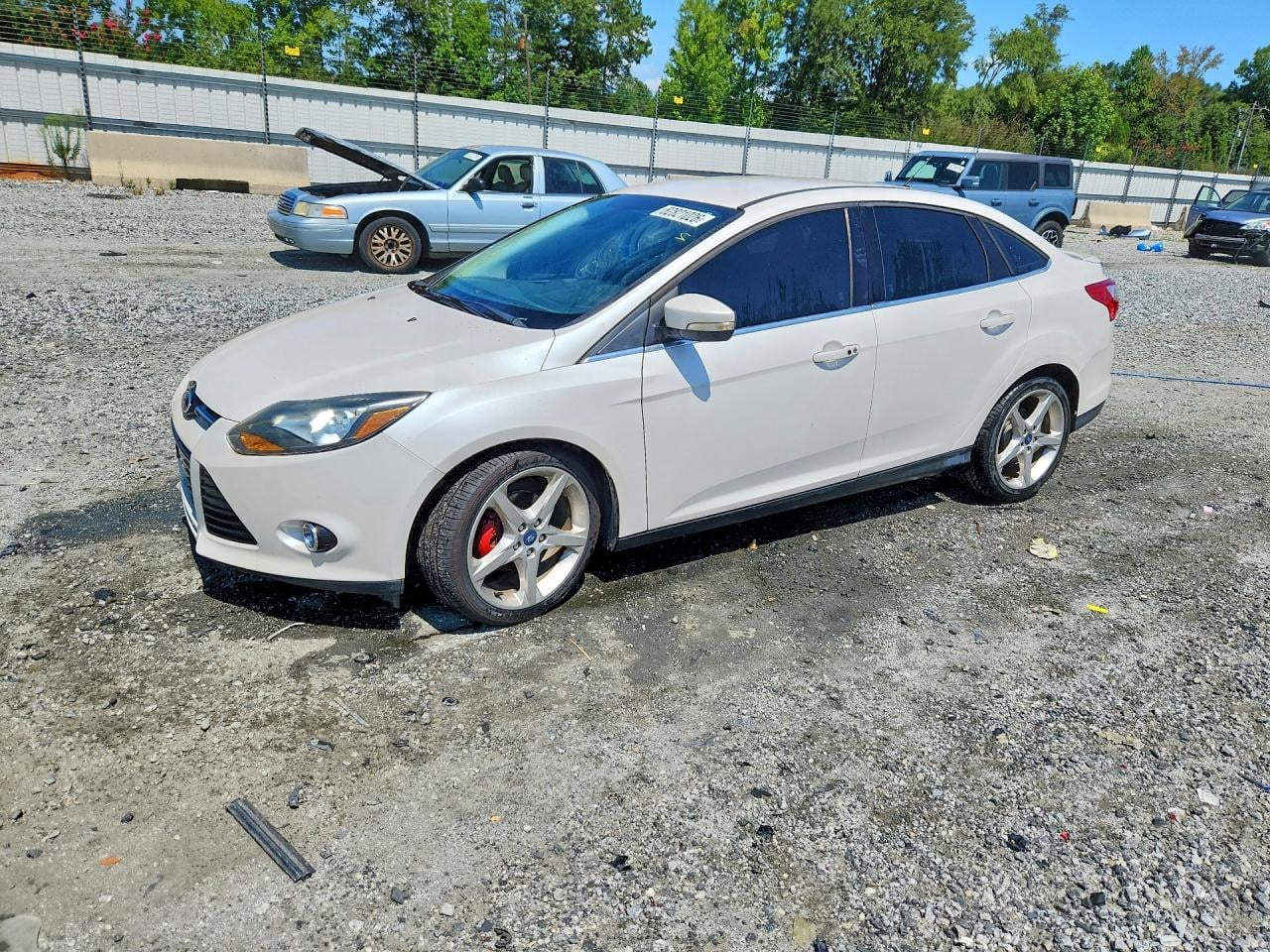 2012 FORD FOCUS TITANIUM | 1FAHP3J24CL432504 | UPCARS