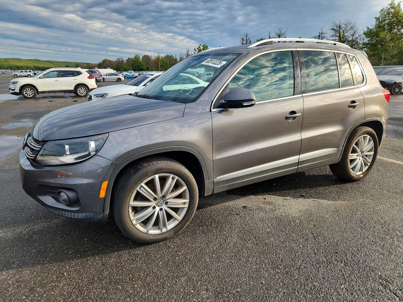 2014 VOLKSWAGEN TIGUAN S | WVGBV3AXXEW548336 | UPCARS