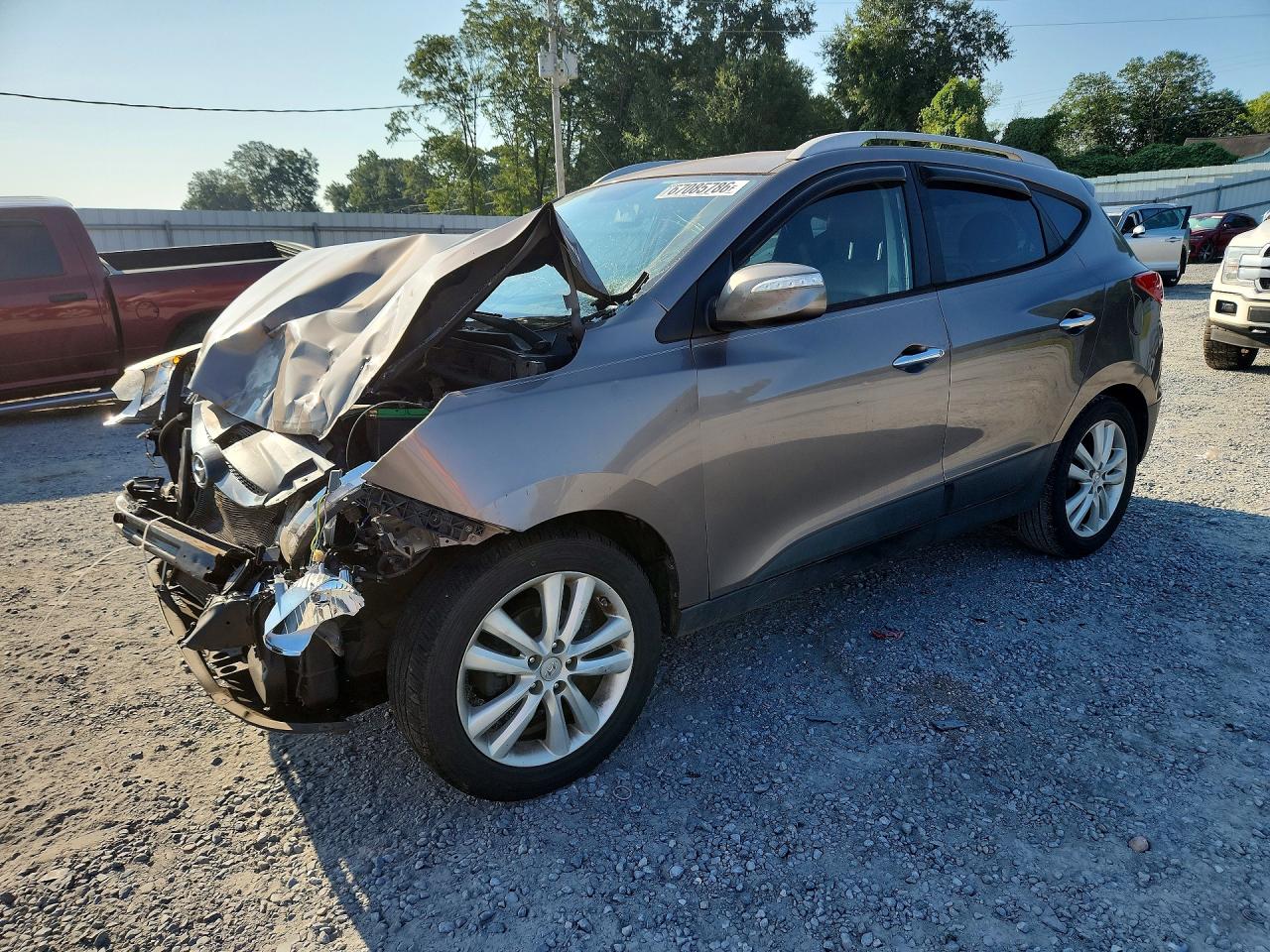 2011 HYUNDAI TUCSON LIMITED | KM8JU3AC9BU296906 | UPCARS