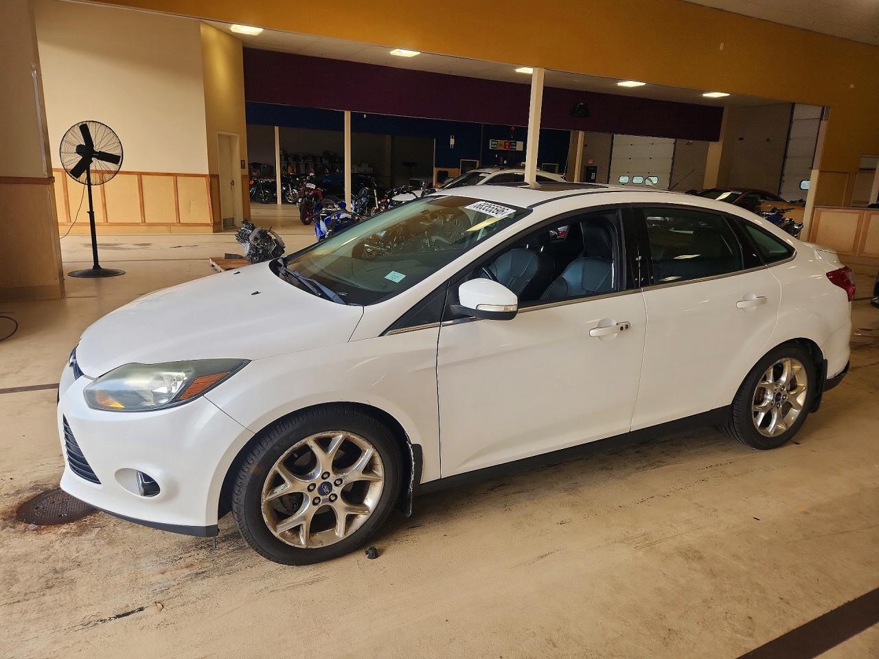 2013 FORD FOCUS TITANIUM | 1FADP3J28DL368094 | UPCARS