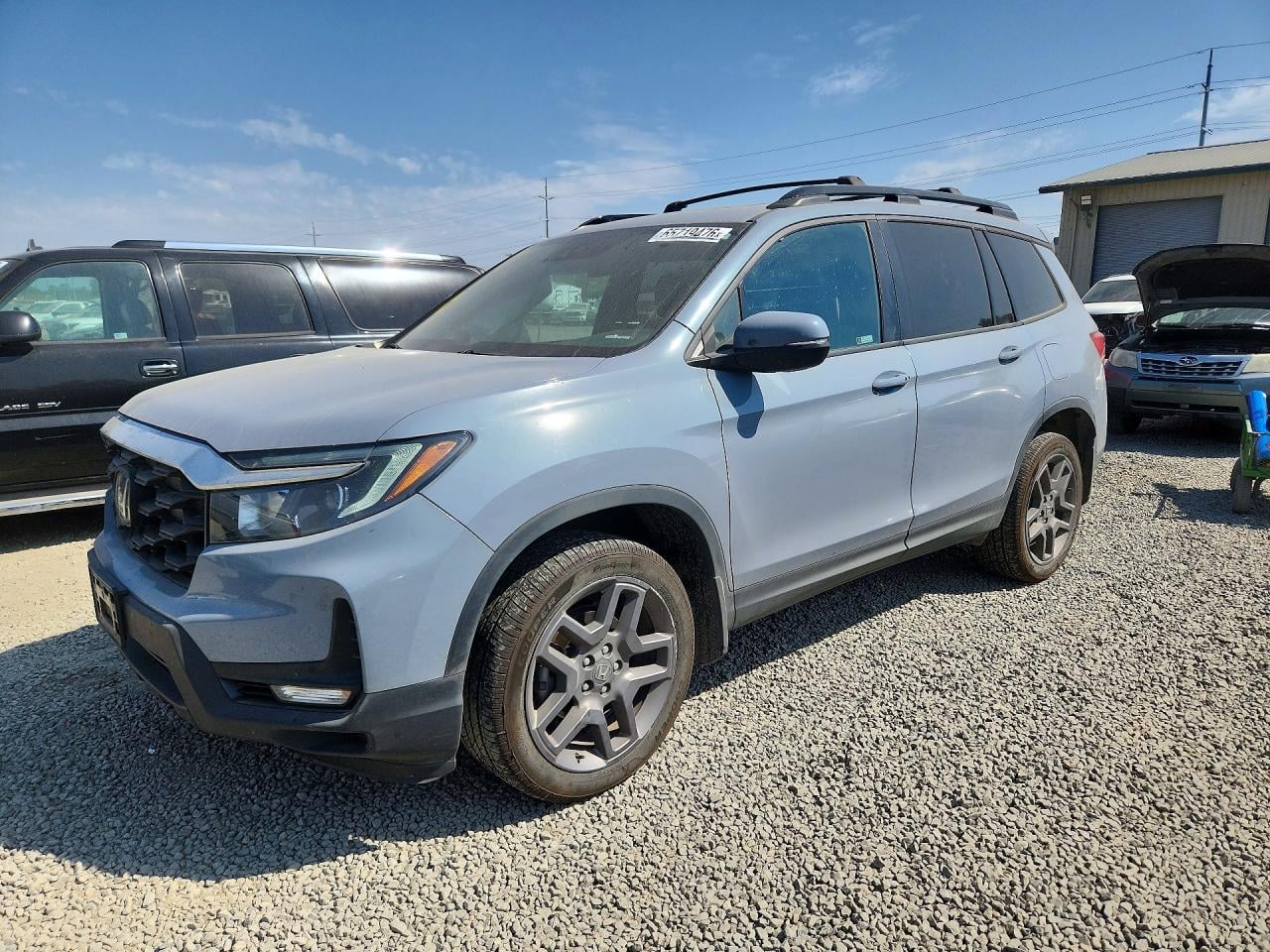 2023 HONDA PASSPORT EXL | 5FNYF8H58PB038569 | UPCARS