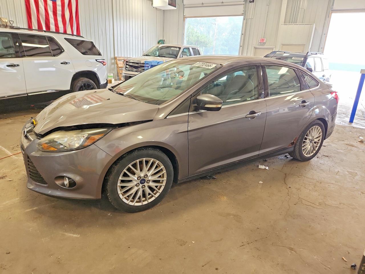2014 FORD FOCUS TITANIUM | 1FADP3J25EL241627 | UPCARS