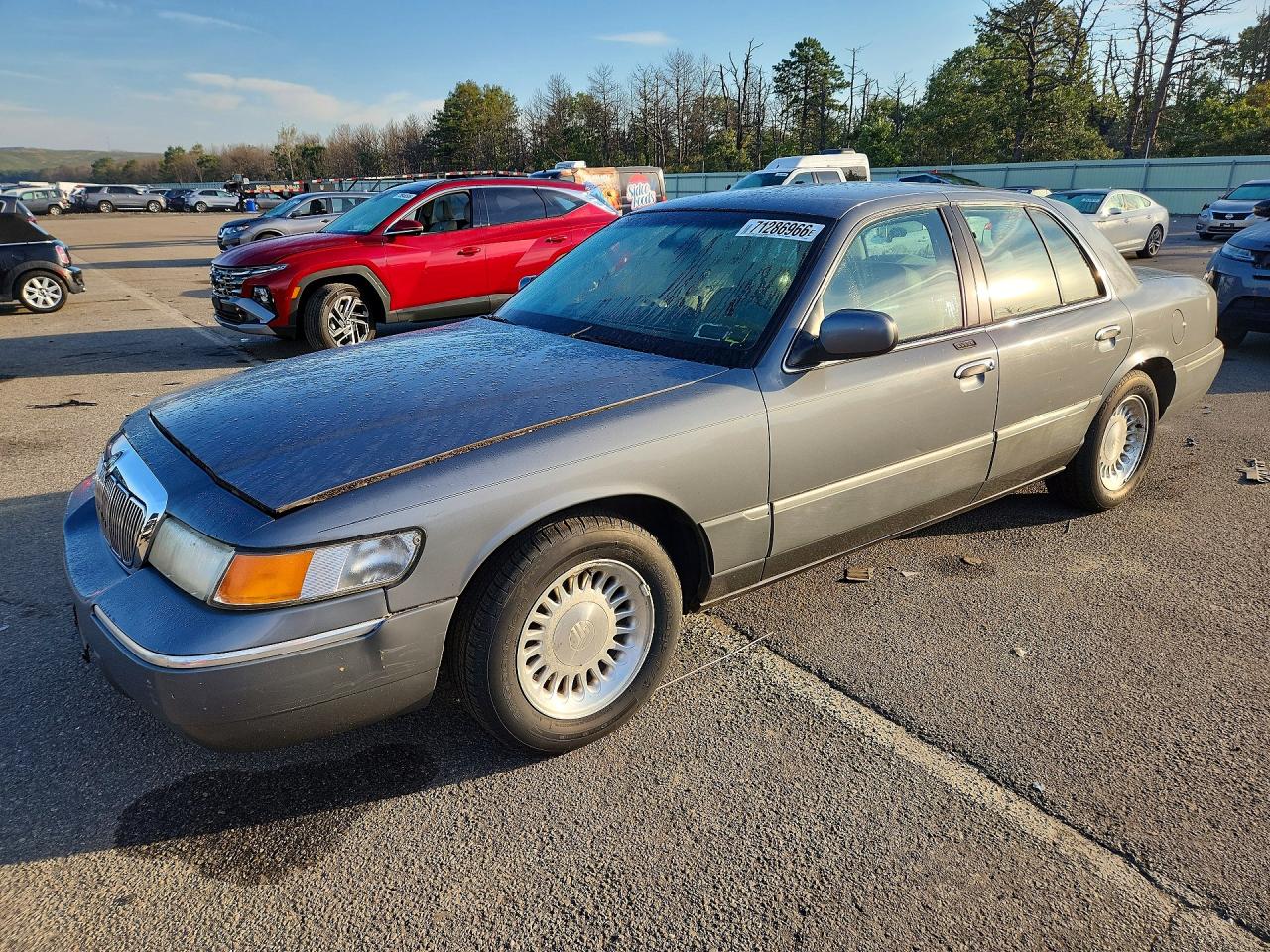 1999 MERCURY GRMARQUIS LS | 2MEFM75W4XX702448 | UPCARS
