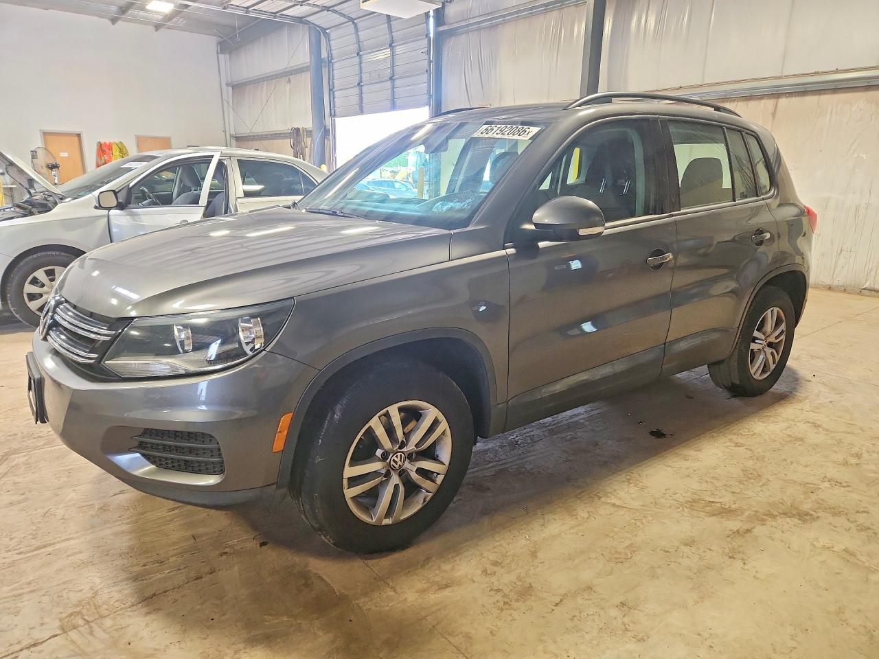 2015 VOLKSWAGEN TIGUAN S | WVGAV7AX6FW566403 | UPCARS