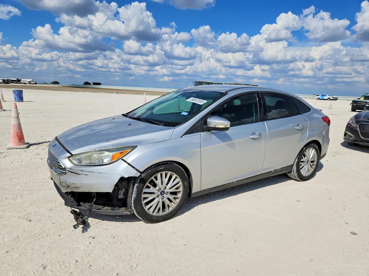 2016 FORD FOCUS TITANIUM | 1FADP3J2XGL360518 | UPCARS