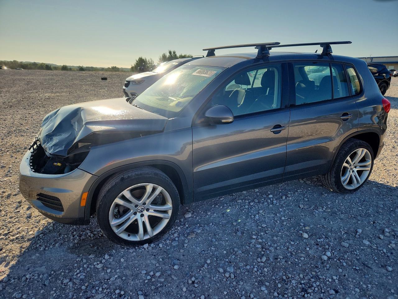 2014 VOLKSWAGEN TIGUAN S | WVGBV3AX3EW563499 | UPCARS