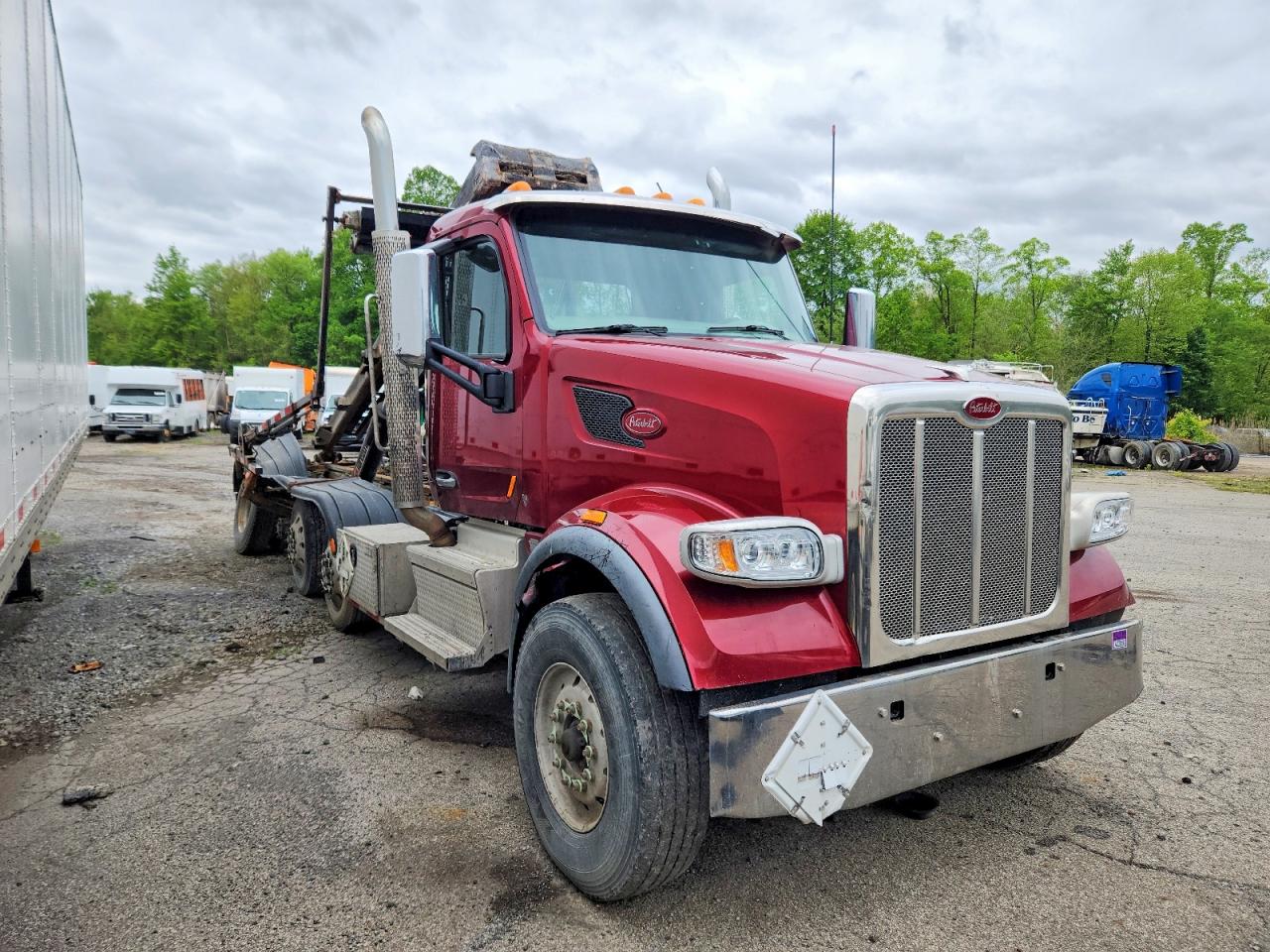 2019 PETERBILT ALL OTHE ROLL-OFF CONTAINER TRUCK | 1NPCL40X0KD604595 | UPCARS