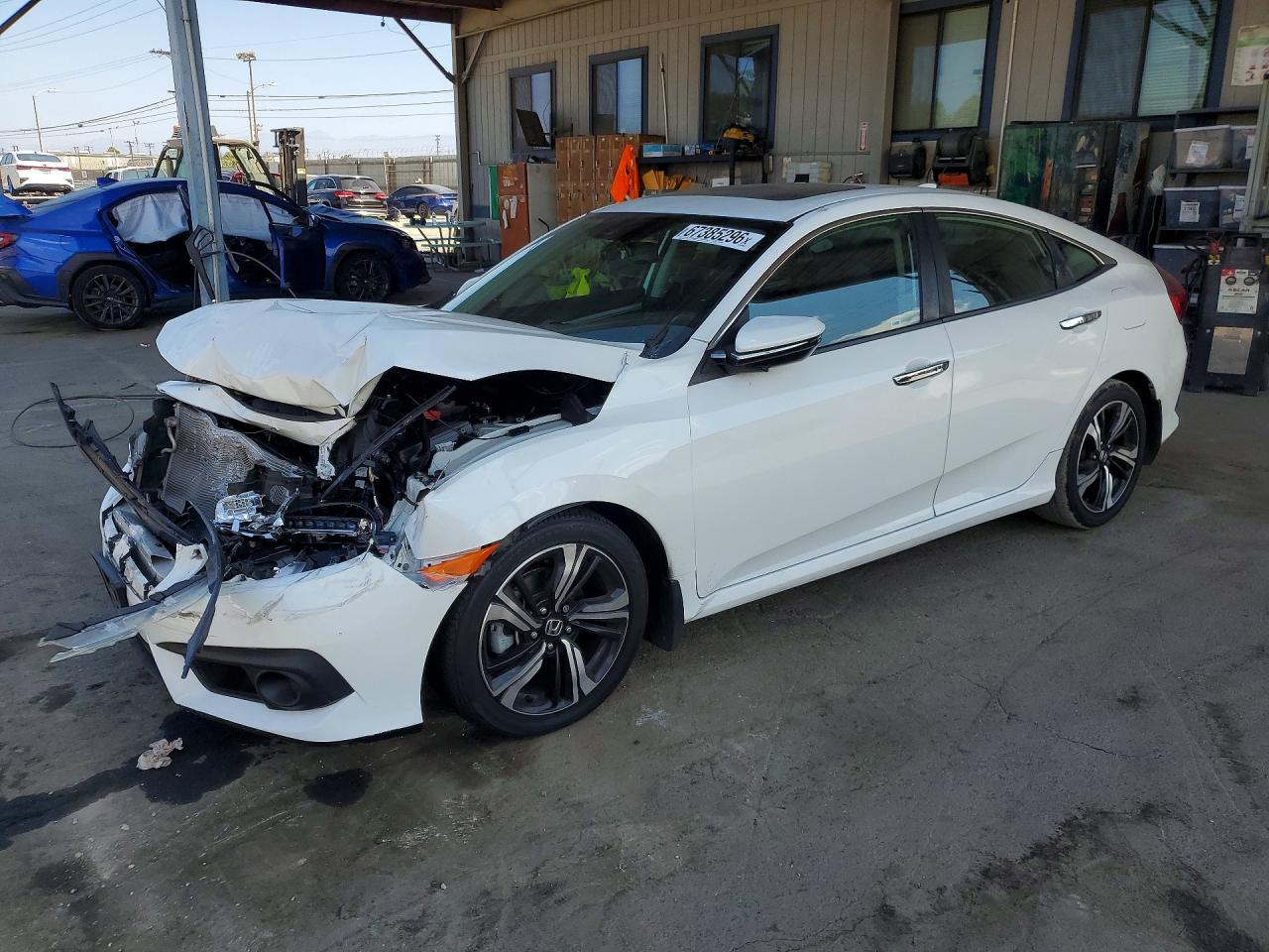 2016 HONDA CIVIC TOURING | 2HGFC1F93GH641647 | UPCARS